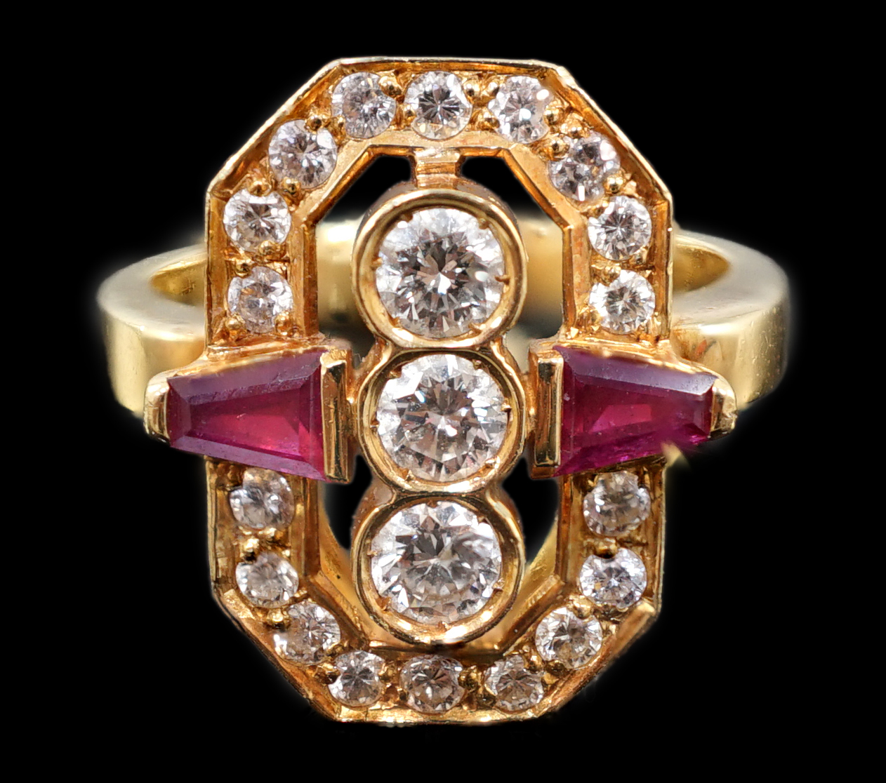 A modern gold, ruby and diamond cluster dress ring